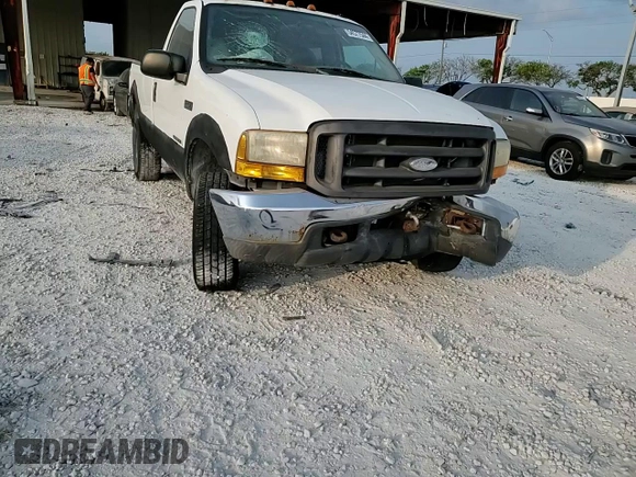 2000 Ford Super Duty F-250 XL with VIN 1FTNF21F7YEA97991, listed as a Copart auction lot 54577544 with 82,036 mi miles and Salvage Title. Bid and sale history available at carsss.com. Image 11.