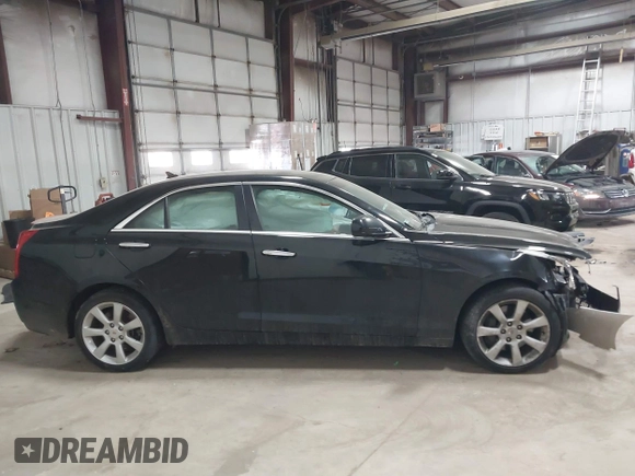 2013 Cadillac ATS with VIN 1G6AG5RX5D0172403, listed as a IAAI auction lot 41362636 with 117,329 mi miles and . Bid and sale history available at DreamBid. Image 13.