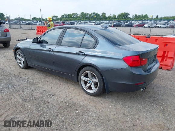2014 BMW 3 Series 328i xDrive with VIN WBA3B3C55EJ977584, listed as a IAAI auction lot 42805585 with 135,855 mi miles and . Bid and sale history available at DreamBid. Image 3.