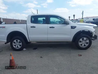 2019 Ford Ranger XL with VIN 1FTER4EH9KLA56165, listed as a IAAI auction lot 41913401 with 103,484 mi miles. Bid and sale history available at carsss.com. Image 13.