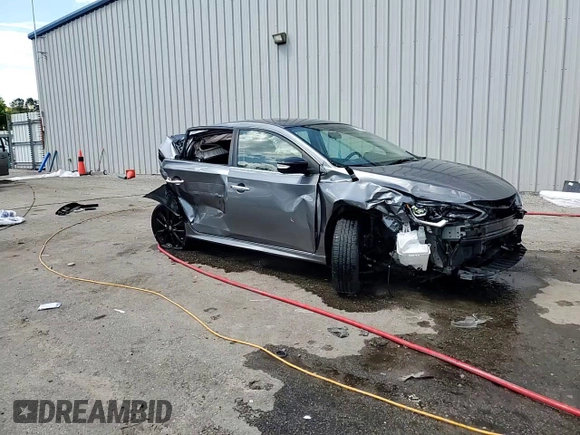 2018 Nissan Sentra SV z VIN 3N1AB7AP9JY281986, wystawiony jako Copart lot #56229955 z przebiegiem 126 585 mil mil oraz Nie do naprawy • Non repairable. Historia ofert i sprzedaży dostępna na DreamBid. Obrazek 14.
