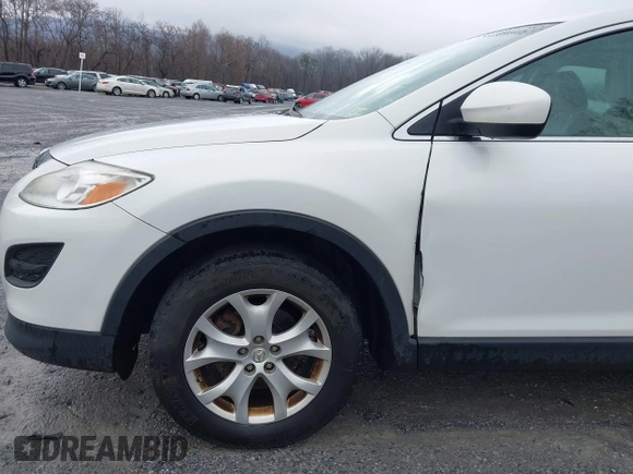 2011 Mazda CX-9 Sport with VIN JM3TB3BV9B0304410, listed as a IAAI auction lot 41511952 with 136,769 mi miles and . Bid and sale history available at DreamBid. Image 12.