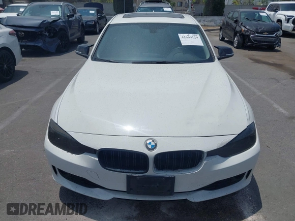 2014 BMW 3 Series 328i with VIN WBA3C1C52EK110753, listed as a IAAI auction lot 42444129 with 169,035 mi miles and . Bid and sale history available at DreamBid. Image 12.