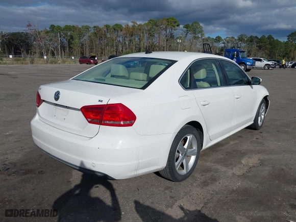 2013 Volkswagen Passat SE w/Sunroof with VIN 1VWBH7A30DC080176, listed as a IAAI auction lot 40941070 with 155,815 mi miles. Bid and sale history available at carsss.com. Image 4.