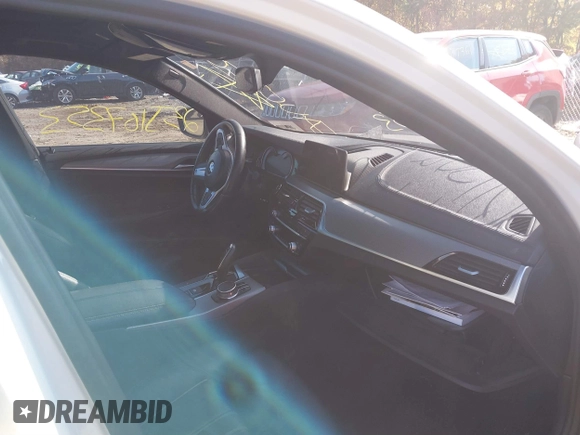 2018 BMW 5 Series 530i xDrive with VIN WBAJA7C58JG907988, listed as a IAAI auction lot 38011708 with Not provided miles and . Bid and sale history available at DreamBid. Image 5.