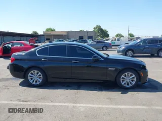 2015 BMW 5 Series 528i with VIN WBA5A5C51FD516003, listed as a IAAI auction lot 42386713 with 105,317 mi miles and . Bid and sale history available at DreamBid. Image 14.