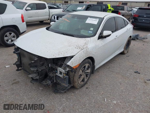 2020 Honda Civic LX with VIN 19XFC2F62LE021811, listed as a IAAI auction lot 41591466 with 75,797 mi miles and . Bid and sale history available at DreamBid. Image 18.