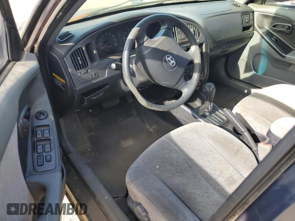 2004 Hyundai Elantra GLS z VIN KMHDN46D94U898709, wystawiony jako Copart lot #84770704 z przebiegiem 216 785 mil mil oraz Szkoda całkowita • Salvage title. Historia ofert i sprzedaży dostępna na DreamBid. Obrazek 8.