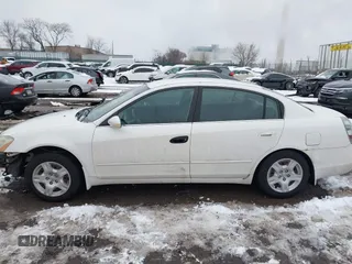 2004 Nissan Altima S with VIN 1N4AL11D64C137926, listed as a IAAI auction lot 41571445 with 124,147 mi miles. Bid and sale history available at carsss.com. Image 15.