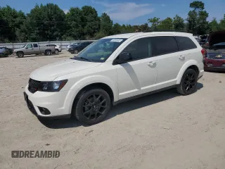 2018 Dodge Journey SXT with VIN 3C4PDCBB0JT218009, listed as a Copart auction lot 64659445 with 104,535 mi miles and Salvage title. Bid and sale history available at DreamBid. Image 1.