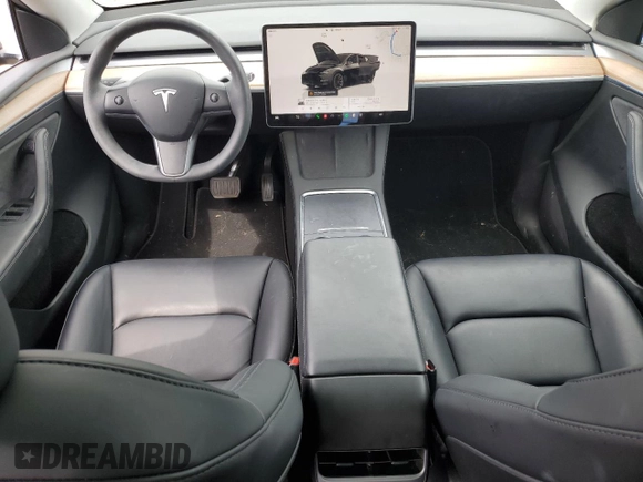 2023 Tesla Model Y Long Range z VIN 7SAYGDEE0PF869710, wystawiony jako Copart lot #52885365 z przebiegiem 13 919 mil mil oraz Szkoda całkowita • Salvage title. Historia ofert i sprzedaży dostępna na DreamBid. Obrazek 8.