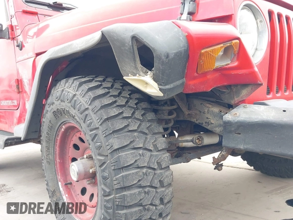 1998 Jeep Wrangler SE with VIN 1J4FY29P2WP791317, listed as a IAAI auction lot 41748523 with 169,052 mi miles. Bid and sale history available at carsss.com. Image 6.