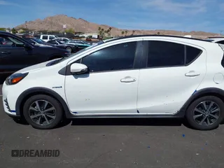 2018 Toyota Prius One with VIN JTDKDTB32J1599890, listed as a IAAI auction lot 42009820 with 57,959 mi miles and . Bid and sale history available at DreamBid. Image 14.