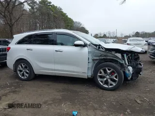 2018 Kia Sorento SX with VIN 5XYPKDA51JG405998, listed as a IAAI auction lot 41837641 with 138,909 mi miles and . Bid and sale history available at carsss.com. Image 14.
