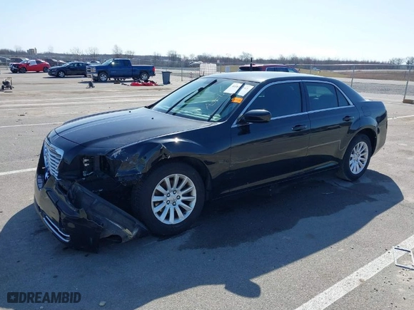 2012 Chrysler 300 with VIN 2C3CCAAG8CH245879, listed as a IAAI auction lot 41811243 with 177,634 mi miles. Bid and sale history available at carsss.com. Image 2.
