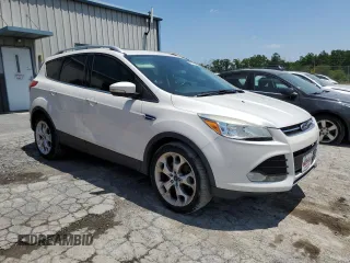 2016 Ford Escape Titanium with VIN 1FMCU9J96GUA48071, listed as a Copart auction lot 60742815 with 193,100 mi miles and Salvage title. Bid and sale history available at DreamBid. Image 4.