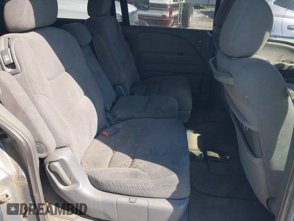 2005 Honda Odyssey EX with VIN 5FNRL38465B059893, listed as a IAAI auction lot 42790058 with 257,143 mi miles and . Bid and sale history available at DreamBid. Image 8.