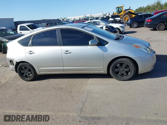 2005 Toyota Prius z VIN JTDKB20UX53080527, wystawiony jako IAAI lot #41831153 z przebiegiem 256 327 mil mil oraz . Historia ofert i sprzedaży dostępna na DreamBid. Obrazek 14.