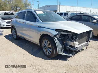2019 Infiniti QX50 LUXE with VIN 3PCAJ5M19KF144488, listed as a IAAI auction lot 41811631 with 99,640 mi miles. Bid and sale history available at carsss.com. Image 1.