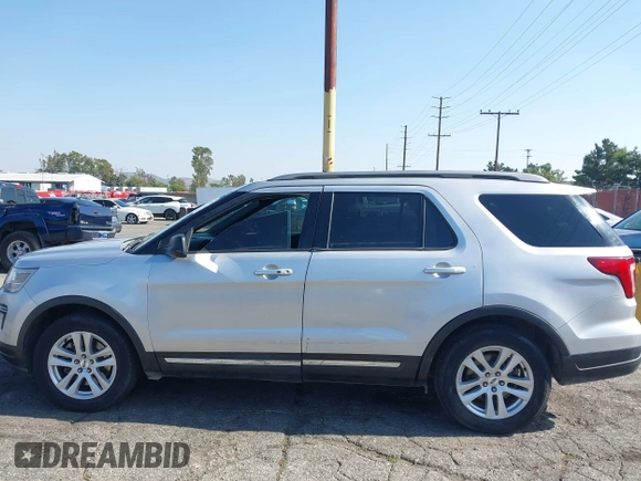 2018 Ford Explorer XLT z VIN 1FM5K7D84JGA81047, wystawiony jako IAAI lot #42216772 z przebiegiem 127 613 mil mil oraz . Historia ofert i sprzedaży dostępna na DreamBid. Obrazek 14.