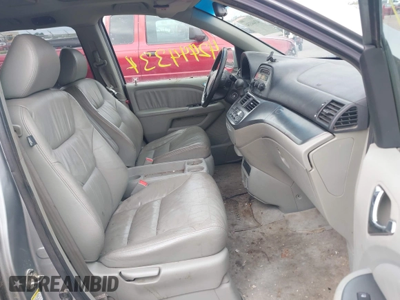 2007 Honda Odyssey EX-L z VIN 5FNRL38717B124209, wystawiony jako IAAI lot #42444334 z przebiegiem 230 123 mil mil oraz . Historia ofert i sprzedaży dostępna na DreamBid. Obrazek 5.