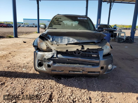 2010 Toyota RAV4 Sport with VIN JTMWK4DV9AD003233, listed as a Copart auction lot 53918805 with 147,127 mi miles and Salvage title. Bid and sale history available at DreamBid. Image 5.