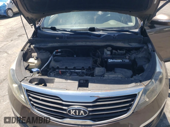 2012 Kia Sportage LX with VIN KNDPB3A20C7276250, listed as a Copart auction lot 61804995 with 112,303 mi miles and Salvage title. Bid and sale history available at DreamBid. Image 12.