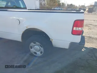 2005 Ford F-150 XL with VIN 1FTRF12285NB41452, listed as a IAAI auction lot 41903892 with 290,233 mi miles. Bid and sale history available at carsss.com. Image 13.