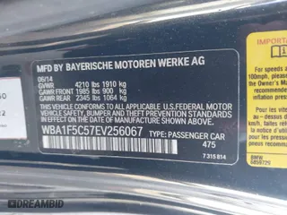 2014 BMW 2 Series 228i with VIN WBA1F5C57EV256067, listed as a IAAI auction lot 41283608 with 108,128 mi miles. Bid and sale history available at carsss.com. Image 9.