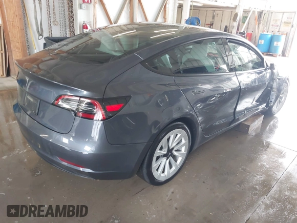 2023 Tesla Model 3 z VIN 5YJ3E1EA2PF591661, wystawiony jako IAAI lot #42014086 z przebiegiem 13 945 mil mil oraz . Historia ofert i sprzedaży dostępna na DreamBid. Obrazek 4.