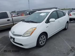 2007 Toyota Prius z VIN JTDKB20UX77550163, wystawiony jako IAAI lot #42379609 z przebiegiem 136 507 mil mil oraz . Historia ofert i sprzedaży dostępna na DreamBid. Obrazek 2.