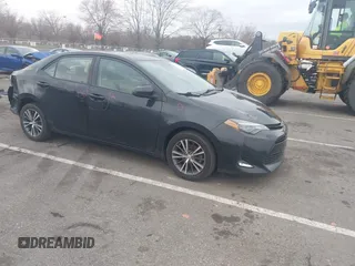 2019 Toyota Corolla L z VIN 2T1BURHE5KC184233, wystawiony jako IAAI lot #41810671 z przebiegiem 127 043 mil mil oraz . Historia ofert i sprzedaży dostępna na DreamBid. Obrazek 1.