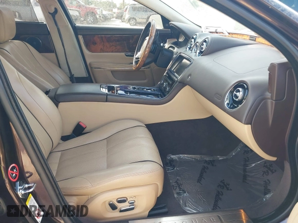 2013 Jaguar XJ Portfolio with VIN SAJWJ2GD2D8V44780, listed as a IAAI auction lot 41875069 with 87,806 mi miles and . Bid and sale history available at DreamBid. Image 5.