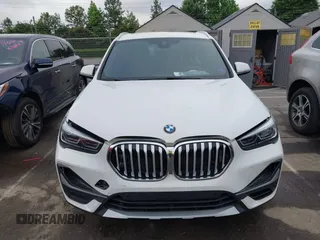 2021 BMW X1 xDrive28i with VIN WBXJG9C01M5S06181, listed as a IAAI auction lot 42292167 with 55,966 mi miles and . Bid and sale history available at DreamBid. Image 6.