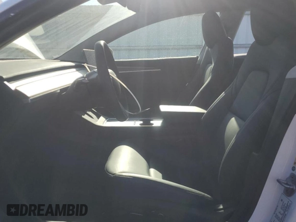 2023 Tesla Model 3 with VIN 5YJ3E1EA1PF556562, listed as a Copart auction lot 48413235 with 11,980 mi miles and Salvage Title. Bid and sale history available at DreamBid. Image 7.