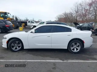2015 Dodge Charger SE z VIN 2C3CDXBG6FH874656, wystawiony jako IAAI lot #41886805 z przebiegiem 121 568 mil mil oraz . Historia ofert i sprzedaży dostępna na DreamBid. Obrazek 14.