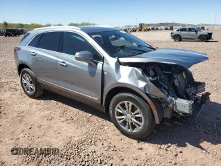 2021 Cadillac XT5 FWD Premium Luxury with VIN 1GYKNCRS9MZ186536, listed as a Copart auction lot 49745915 with 28,321 mi miles and Salvage Title. Bid and sale history available at carsss.com. Image 4.