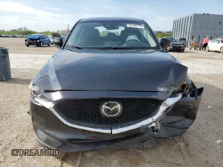 2021 Mazda CX-5 Sport with VIN JM3KFABM9M0301909, listed as a Copart auction lot 52188175 with 73,607 mi miles and Non Repairable. Bid and sale history available at carsss.com. Image 5.