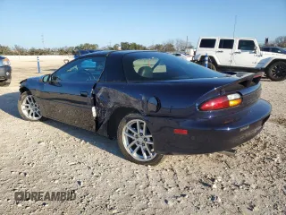 2000 Chevrolet Camaro Z28 z VIN 2G1FP22G3Y2123001, wystawiony jako Copart lot #85730994 z przebiegiem 32 579 mil mil oraz Szkoda całkowita • Salvage title. Historia ofert i sprzedaży dostępna na DreamBid. Obrazek 2.