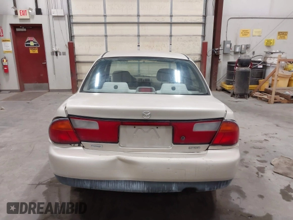 1998 Mazda Protege DX z VIN JM1BC1419W0171802, wystawiony jako IAAI lot #42202861 z przebiegiem 252 304 mil mil oraz . Historia ofert i sprzedaży dostępna na DreamBid. Obrazek 16.