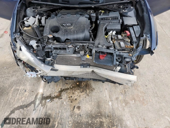 2017 Nissan Maxima SL with VIN 1N4AA6AP0HC409194, listed as a Copart auction lot 57604005 with 98,000 mi miles and Salvage title. Bid and sale history available at DreamBid. Image 11.