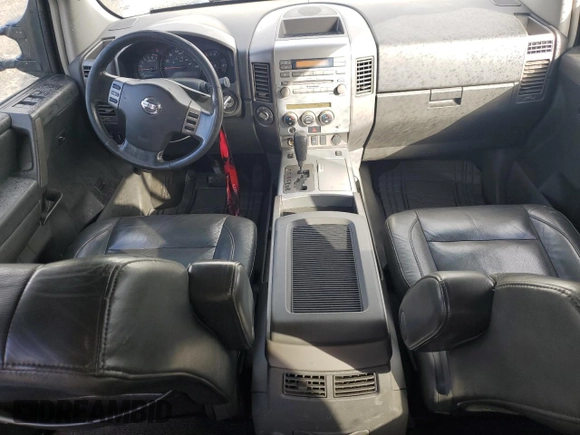 2006 Nissan Titan LE z VIN 1N6AA07B66N556878, wystawiony jako Copart lot #47880935 z przebiegiem 221 371 mil mil oraz Szkoda całkowita • Salvage title. Historia ofert i sprzedaży dostępna na DreamBid. Obrazek 8.