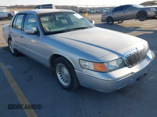 2000 Mercury Grand Marquis LS z VIN 2MEFM75W9YX602086, wystawiony jako IAAI lot #41983981 z przebiegiem 132 012 mil mil oraz . Historia ofert i sprzedaży dostępna na DreamBid. Obrazek 1.