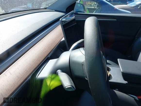 2024 Tesla Model Y Long Range with VIN 7SAYGDEE4RF149457, listed as a IAAI auction lot 41700922 with Not Provided miles. Bid and sale history available at carsss.com. Image 15.