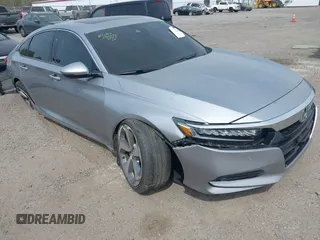 2018 Honda Accord Touring with VIN 1HGCV1F97JA072451, listed as a IAAI auction lot 42122678 with Not provided miles and . Bid and sale history available at DreamBid. Image 1.