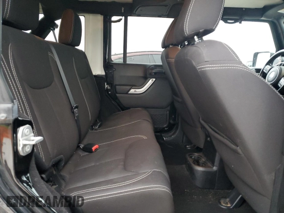 2015 Jeep Wrangler Unlimited Sahara with VIN 1C4BJWEGXFL606573, listed as a Copart auction lot 83983894 with 103,314 mi miles and Clean title. Bid and sale history available at DreamBid. Image 11.