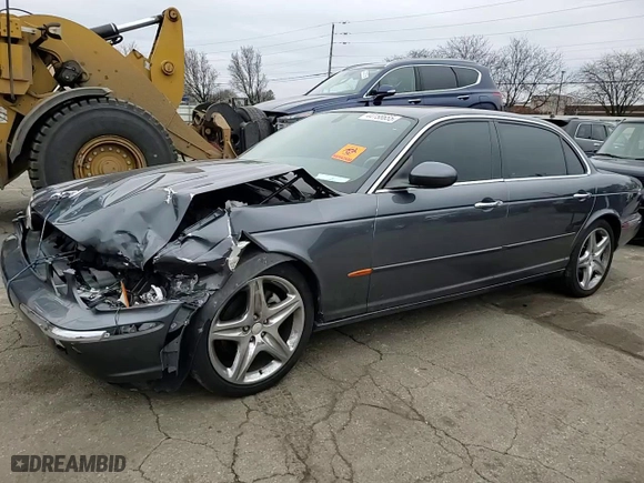 2005 Jaguar XJ with VIN SAJWA79C25SG39994, listed as a Copart auction lot 44158655 with 184,882 mi miles and Salvage Title. Bid and sale history available at carsss.com. Image 10.