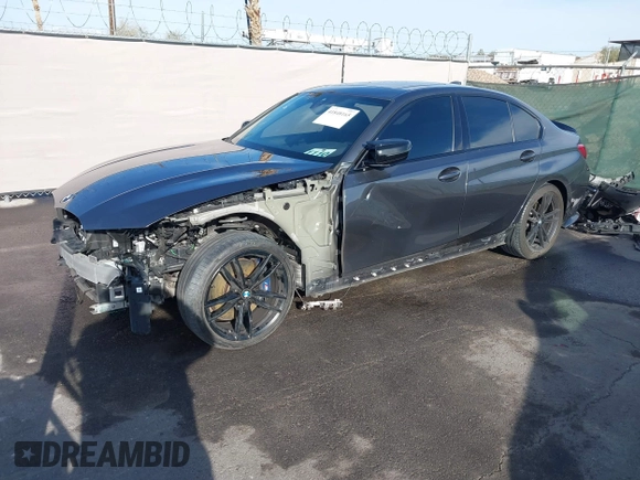 2020 BMW 3 Series M340i with VIN WBA5U7C02LFJ02994, listed as a IAAI auction lot 41848165 with 59,220 mi miles. Bid and sale history available at carsss.com. Image 2.