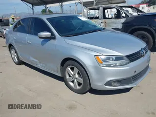2012 Volkswagen Jetta TDI w/Premium z VIN 3VWLL7AJ8CM314305, wystawiony jako IAAI lot #41885355 z przebiegiem 75 669 mil mil oraz . Historia ofert i sprzedaży dostępna na DreamBid. Obrazek 1.