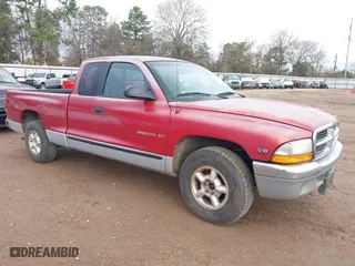 1998 Dodge Dakota SLT with VIN 1B7GL22Y1WS569991, listed as a IAAI auction lot 41689076 with 135,680 mi miles. Bid and sale history available at carsss.com. Image 1.
